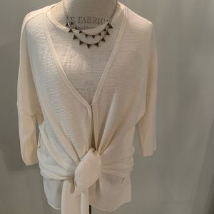 Hemisphere top with a short cardigan over